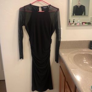 Never worn Bebe black dress